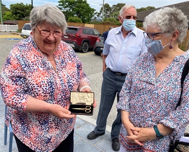 The ribbon was cut with scissors from 1927 on loan from the Gerringong & District Historical Society. G&DHS president Helen McDermott shows the scissors (pictured with G&DHS member and retired Kiama librarian Bobbie Miller)