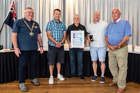 Australia Day Awards recipients photograph of 5 men holding framed certificate.