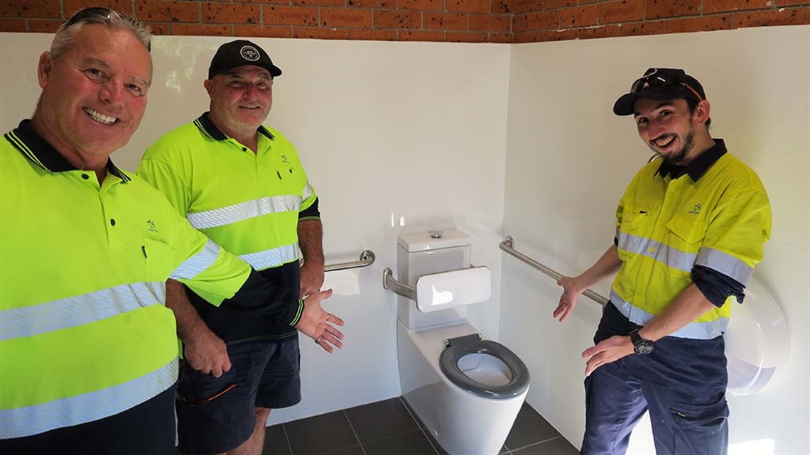 Darren, Vance and Amilton inspect the new accessible toilet at the Gainsborough amenities block