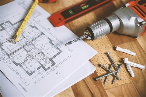 Stock image of plans and tools